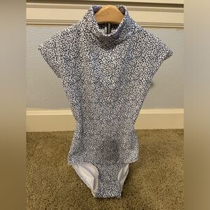 Eleve Dance Leotard. Mock neck, oval open back.